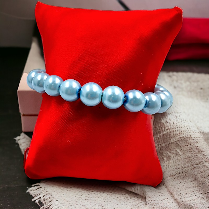 bransoletka z perełek błękitnych na gumce